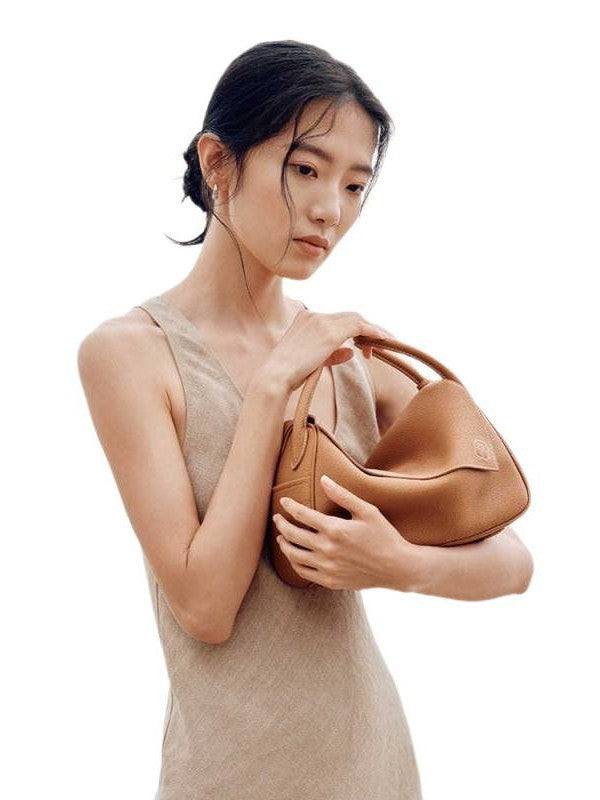 Wang Palace Selected Ingot First Layer Cowhide Pillow Commuter Underarm Shoulder Bags