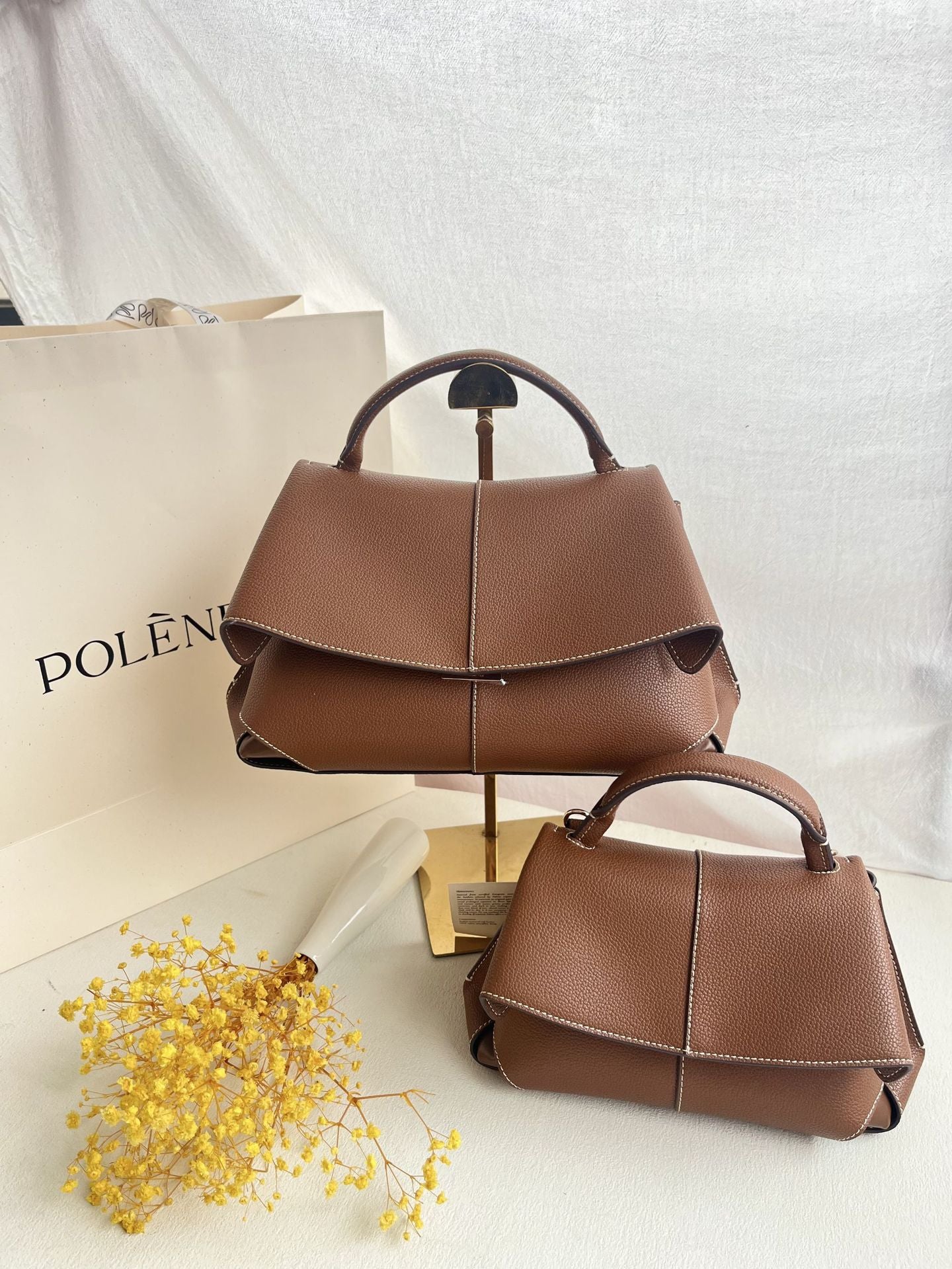 Women's Upgraded French Niche Smile Chaise Leather Women's Handbag