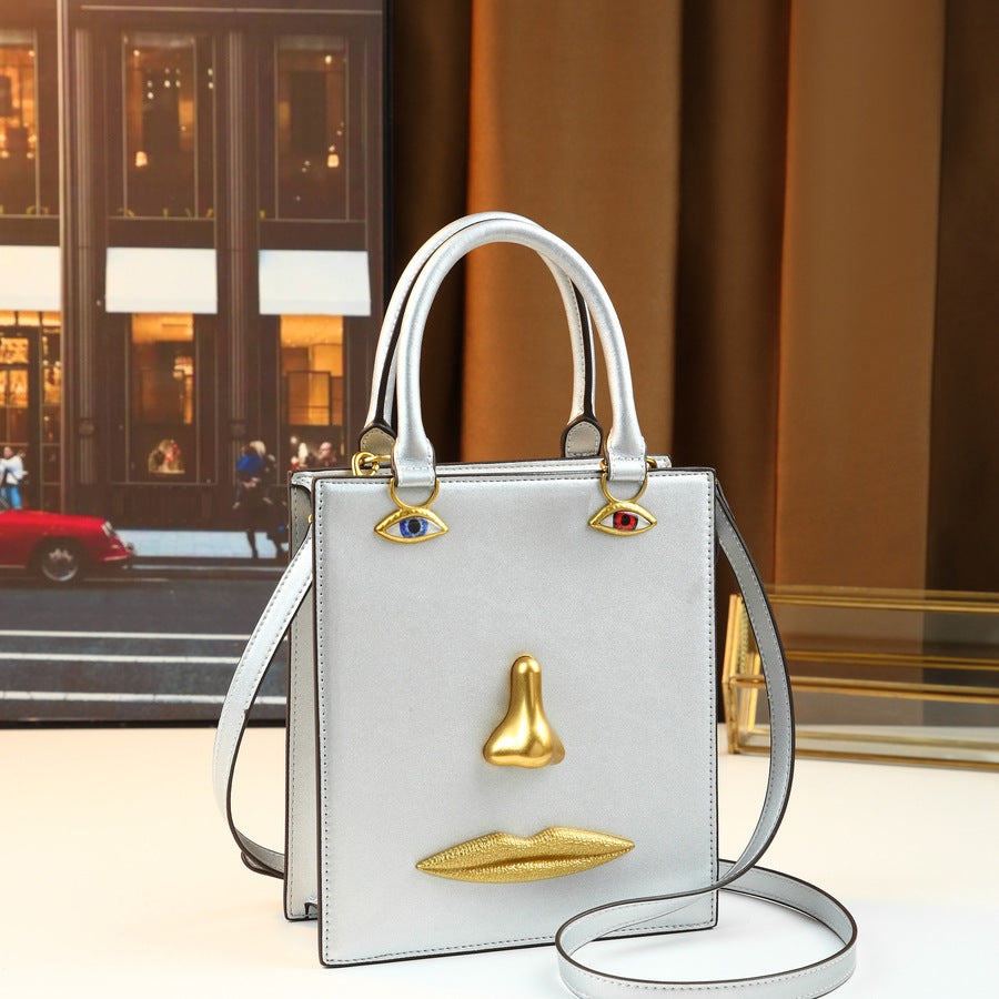 Women's Super Popular Niche Art Face Three-dimensional Metal Facial Design Retro Women's Handbag