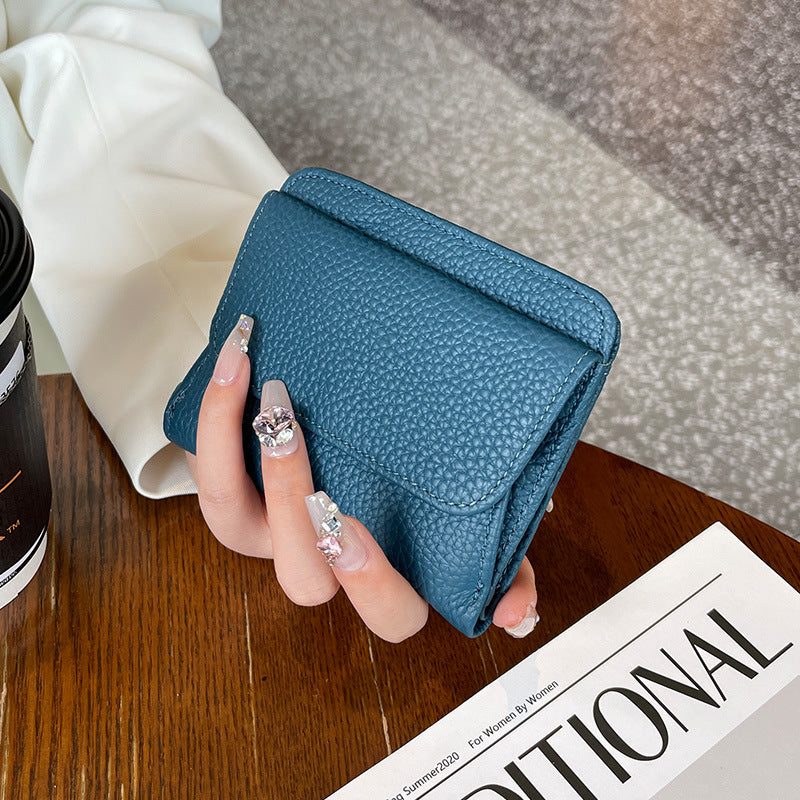 Women's First Layer Cowhide Thin Half Fold Short Compact Coin Purses
