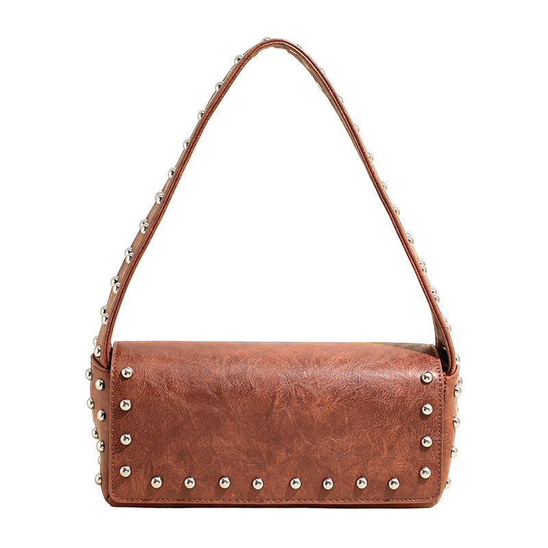 Women's Simple Personality Rivet Pouch Early Spring Niche Handbags