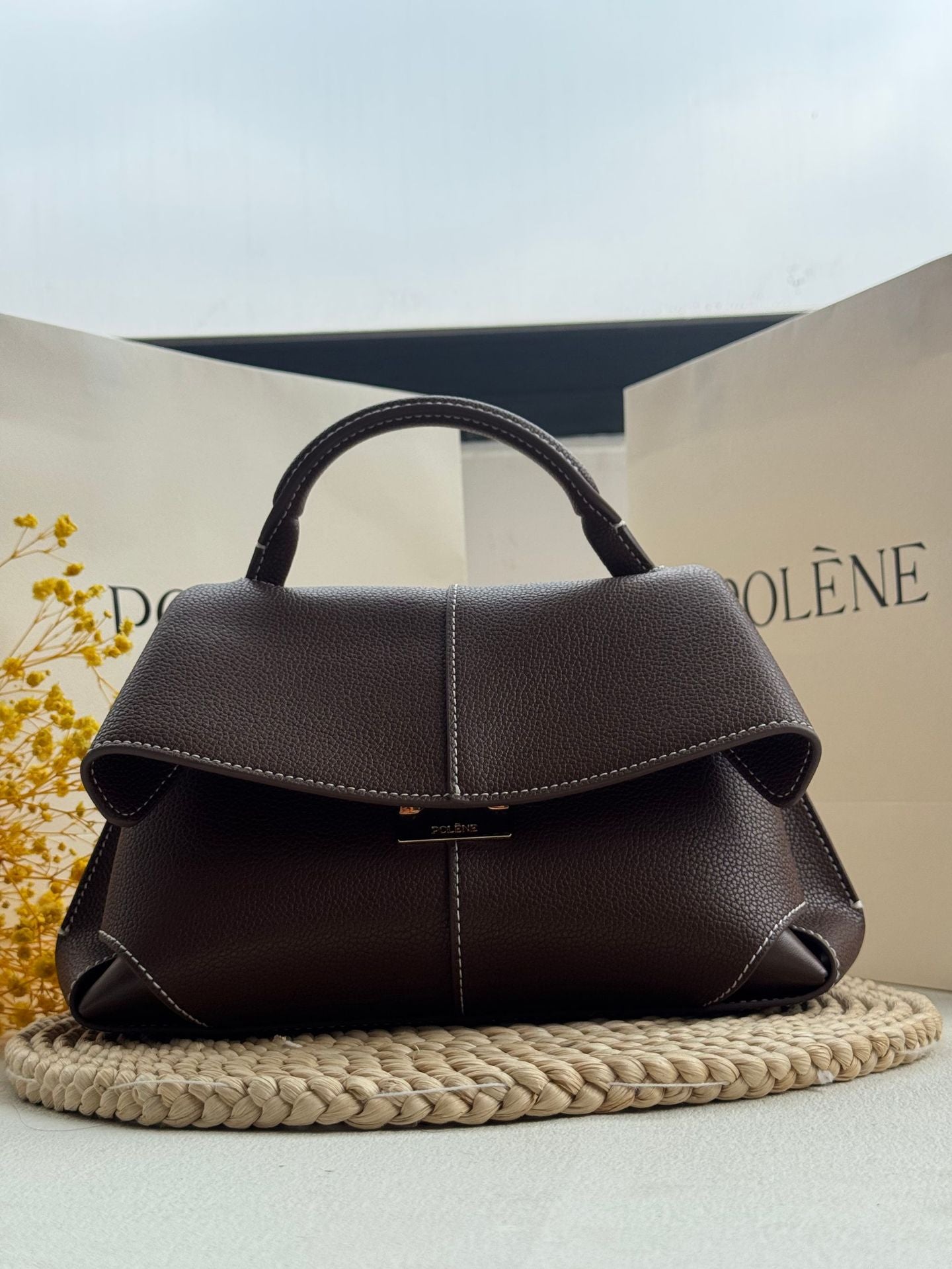Women's Upgraded French Niche Smile Chaise Leather Women's Handbag