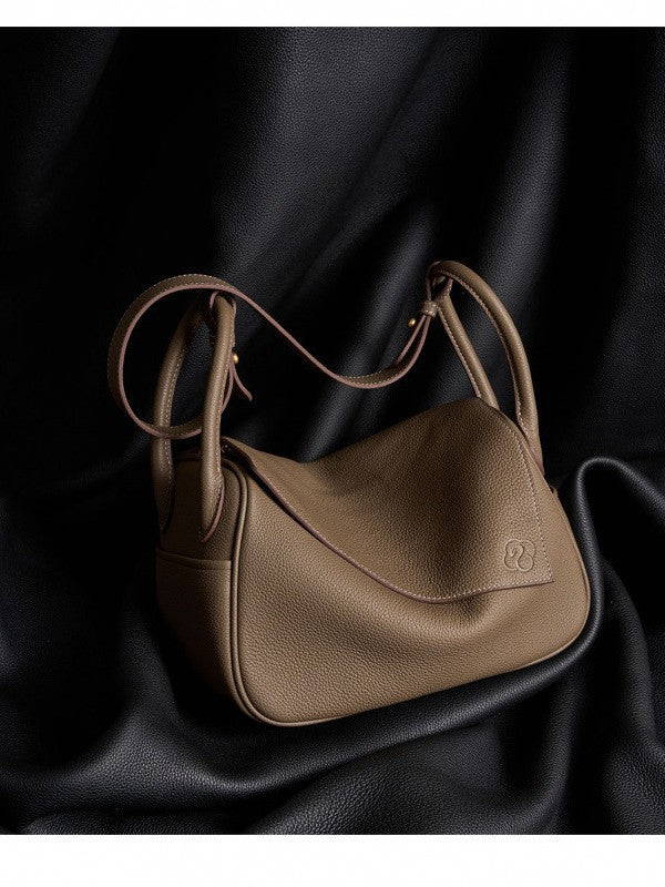 Wang Palace Selected Ingot First Layer Cowhide Pillow Commuter Underarm Shoulder Bags