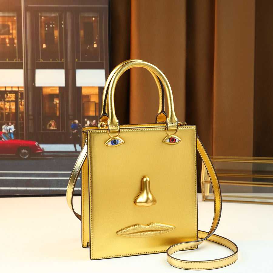 Women's Super Popular Niche Art Face Three-dimensional Metal Facial Design Retro Women's Handbag