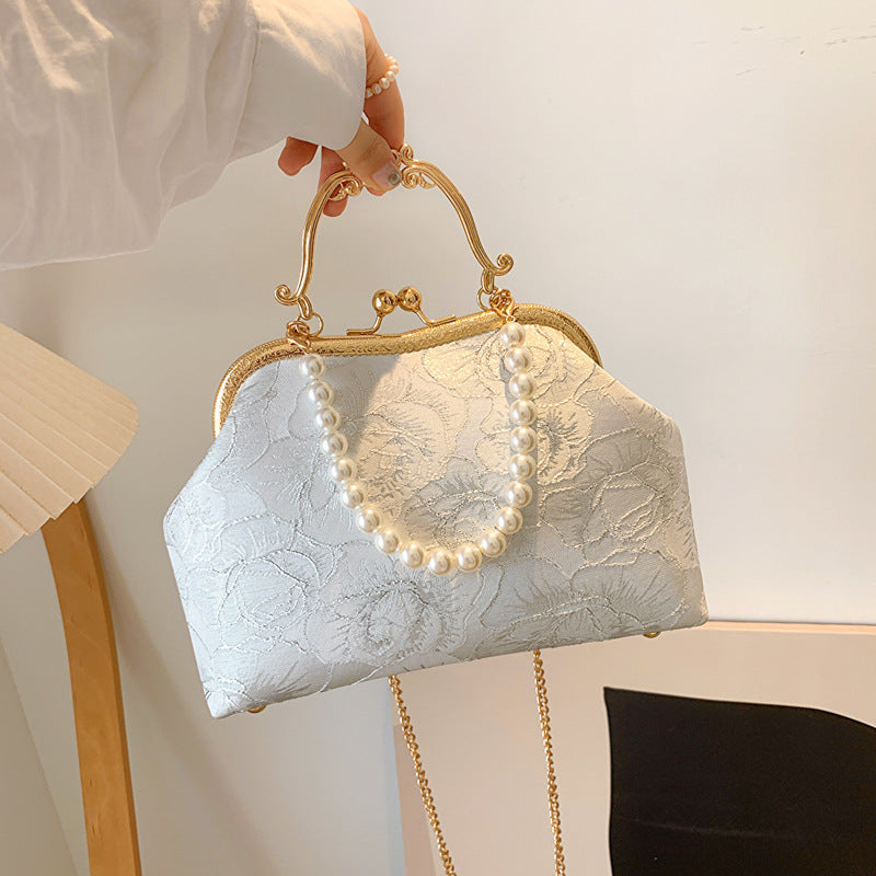Sense Niche Female Summer Style Clutch Antiquity Women's Messenger Bag