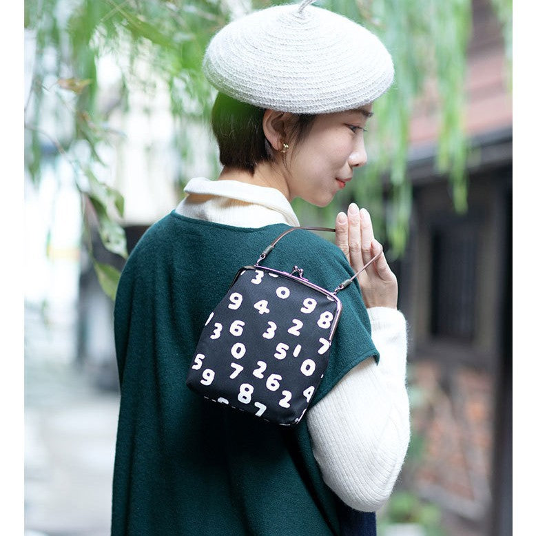Women's Style Canvas Hand Carrying Leather Rope Strap Shell Clip Women's Messenger Bag