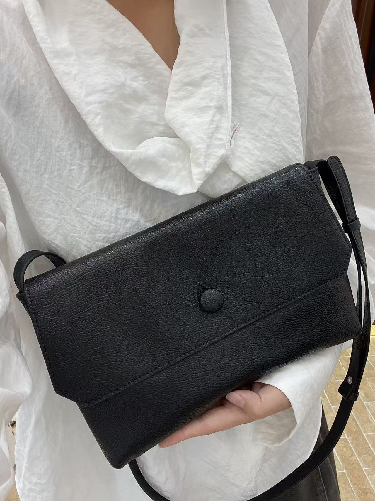 Niche Curved Layer Cowhide Genuine Leather Women's Handbag