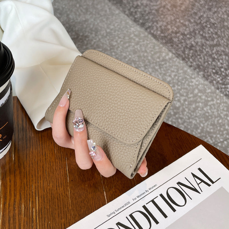Women's First Layer Cowhide Thin Half Fold Short Compact Coin Purses