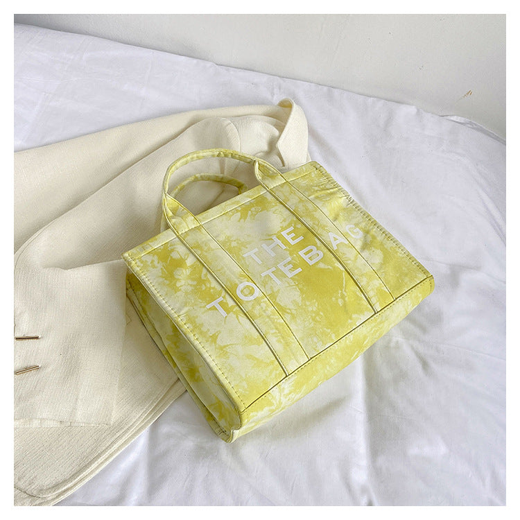 Graceful Trendy Canvas Letter Iti Portable Women's Shoulder Bag