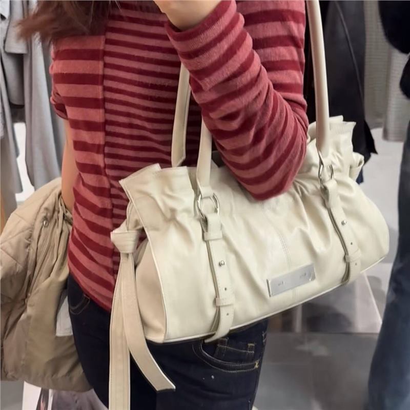 Spring Metal Label Side Strap Long Handbags