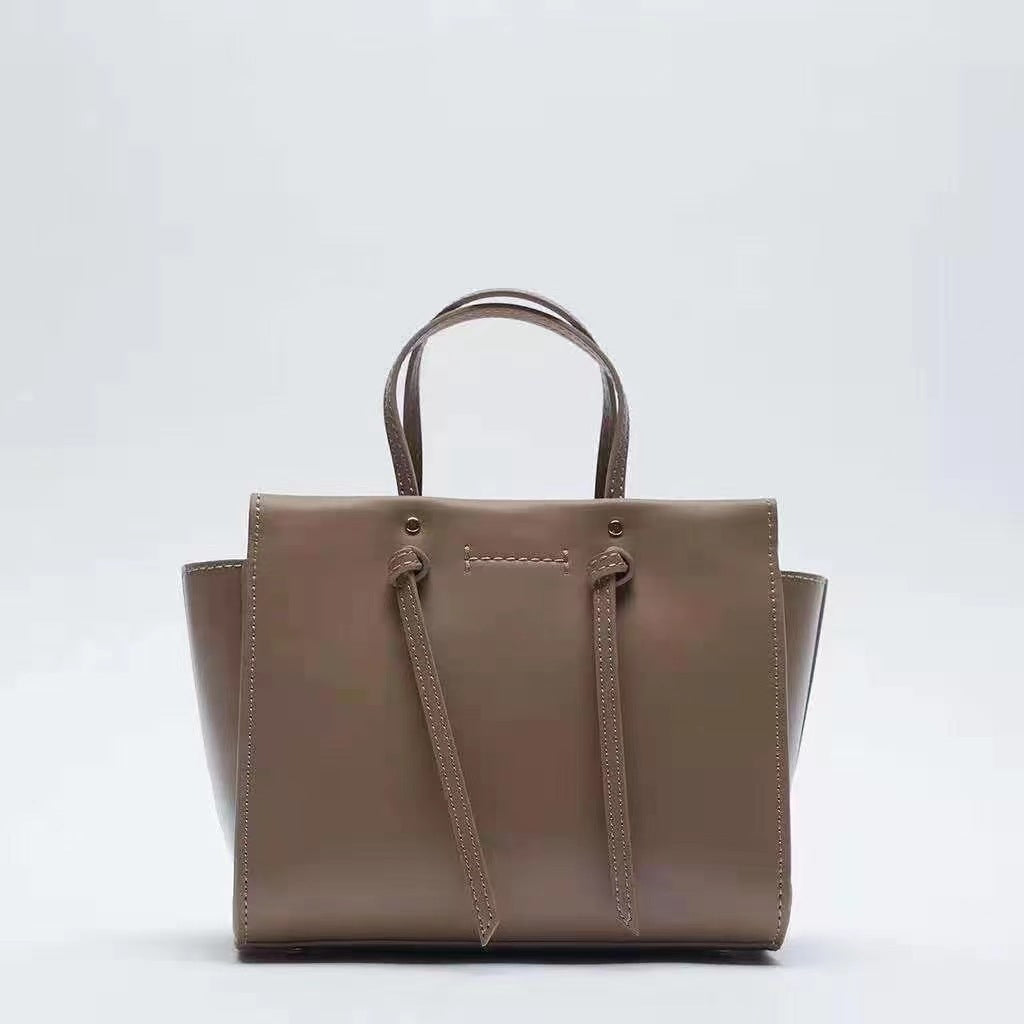 Women's Home Large Capacity Texture Smiling Face Handbags