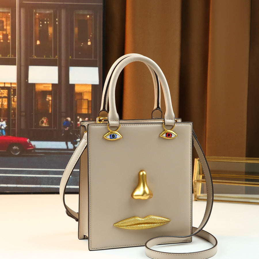 Women's Super Popular Niche Art Face Three-dimensional Metal Facial Design Retro Women's Handbag